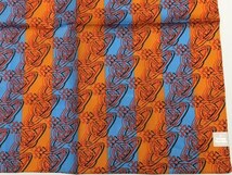 【Vivienne Westwood】(NO.3145）ヴィヴィアンウエストウッド ハンカチ オーブ総柄　オレンジ系　未使用　50cm_画像2