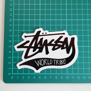 ステューシー ステッカー 送料無料!! 正規品 stussy WORLD TRIBE ブラック STUSSY 黒