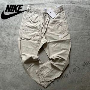 格安送料 2XL 新品 NIKE ナイキ スポーツウェア カフパンツ トラックパンツ コットン ウーブン パンツ ナイロン ジョガー XXL aDD5311-072