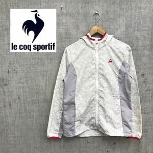 M749-G◆le coq sportif ルコックスポルティフ ウィンドブレーカー◆sizeL レディース アウター 長袖 フード ジャンパー グレー アウトドア