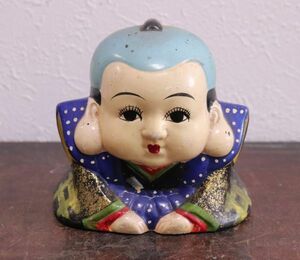  old a bit .... cosmetics . did lovely ceramics made. luck . doll n973