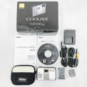 シャッターOK Nikon ニコン COOLPIX クールピクス S1000pj/NIKKOR 5X WIDE OPTICAL ZOOM 5.0-25.0mm 1:3.9-5.8 デジタルカメラ R尼0215〇