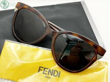 2403312125　△ FENDI フェンディ サングラス FF0125 マーブル柄 ブラウン 茶 サイドロゴ アイウェア 度なし ブランド 中古_画像1