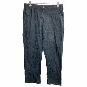 中古 古着 Carhartt ワークパンツ W38 カーハート ペインターパンツ ビッグサイズ ブラック コットン 古着卸 アメリカ仕入 2403-580