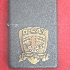 ▲（1）Zippo D-DAY NORMANDY 50周年 専用缶ケース付の画像2