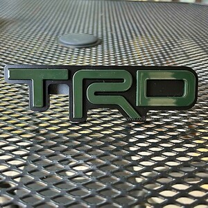 Taco Vinyl/タコビニール TRD グリルバッジ アーミーグリーン