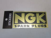 ★送料無料!★【NGK SPARK PLUGS】GOLD ステッカー 横:11cm 縦:5.5cm ★スパークプラグ ロゴ デカール シール 金_画像1