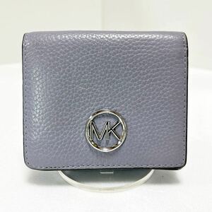 ◆MICHAEL KORS マイケルコース◆ コンパクト 折り財布　本革　小銭入れ＆定期入れ有　ライトパープル 【USED】0313