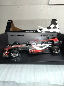 ミニチャンプス 1/18 マクラーレン メルセデス MP4-25 ジェンソン・バトン Vodafone Mclaren MP4/25 J.BUTTON 2010