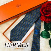 HERMES エルメス メンズ 男性 紳士 ネクタイ ブランドネクタイ 総柄 ブルー 青 バイカラー ビジネス 結婚式 美品 未使用に近い 剣先 8.5cm_画像1