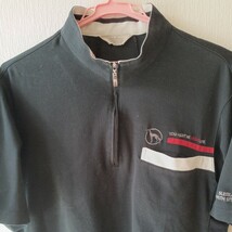 adabat　ゴルフウェア　お洒落なハーフジップ半袖シャツ　サイズは48　黒系　美品_画像1