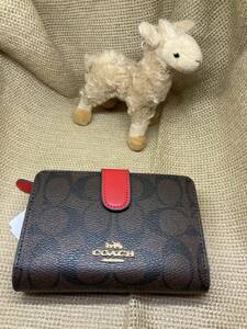 ☆新品未使用　COACH　コーチ　F23553　二つ折り財布　ラグジュアリー　シグネチャー　PVCレザー　コーナージップ　ウォレット☆