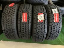 送料込\56,800★tk183-4-3 235/65R18 ブリヂストン DM-V2 スタッドレス 未使用品 2015&16年製 4本セット♪ _画像1