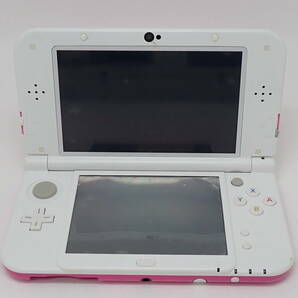 44855 ★ Nintendo 任天堂 3DS LL ピンク×ホワイト RED-001 初期化済み 充電コード付 おまけカセット付 ★ 中古品 動作確認済みの画像5