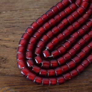  white Hearts Old beads glass 7 millimeter about one ream . red / silver 