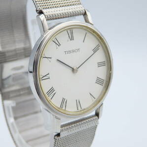 え03287/TISSOT ティソ/クオーツ/メンズ腕時計/ローマン/文字盤ホワイト/ジャンクの画像4