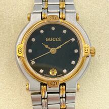 GUCCI グッチ 腕時計 クオーツ QZ 稼働 9000L レディース デイト ゴールド シルバー コンビ ☆1円スタート_画像1