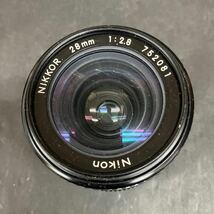 Z1243 希少 Nikon ニコン NIKKOR 28mm 1:2.8 マニュアルフォーカス 一眼レフカメラ用 レンズ キャップ 裏蓋付き 現状 動作未確認 ジャンク_画像2