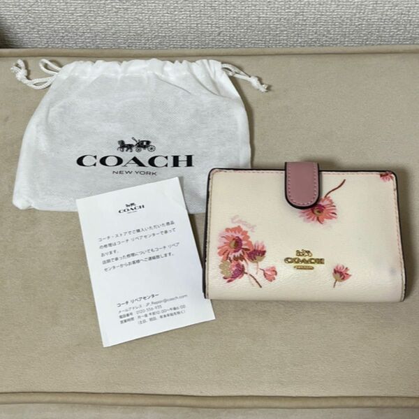 COACH 二つ折り財布　花柄