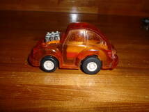 TOMY　トミー　プラ製のプルバックミニカー。ワーゲンビートル　VW。エンジン左右に揺れるギミック付き。透明オレンジ色系。送料220円_画像5