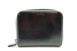 プラダ 二つ折り 財布 ジップアラウンド ロゴ パテントレザー バイカラー 白 ホワイト 黒 ブラック PRADA 8056k