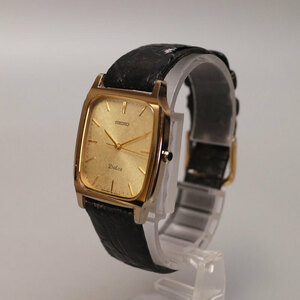 yh42-SEIKO セイコー DOLCE ドルチェ 腕時計 8N41-5070 3針 ゴールド クォーツ メンズ 社名刻印あり （社）日本貨物検数協会