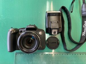 Canon PowerShot SX1 IS キャノン コンパクトデジタルカメラ。4ギガメモリーカード・外付フラッシュ・純正ストラップ付。