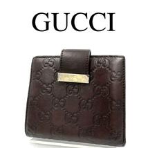 GUCCI グッチ 折り財布 シマ ロゴプレート ロゴ金具 レザー ブラウン系_画像1