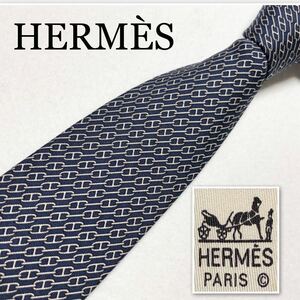 HERMES エルメス　ネクタイ　レジメンタルストライプ　金具　タブ　総柄　シルク100% フランス製　ネイビー　ビジネス