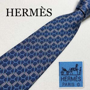 HERMES エルメス　ネクタイ　金具　紐　総柄　シルク100% フランス製　ブルー系　ビジネス