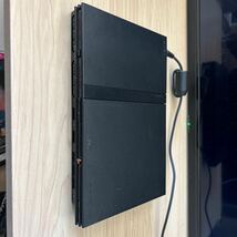 A11 SONY PlayStation2 チャコールブラック SCPH-70000 薄型 動作確認済み 動作良好 封印シール有り 中古品_画像1