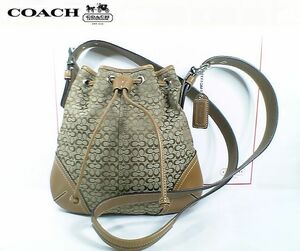 ★未使用！★ＣＯＡＣＨ　コーチ★お洒落で素敵なミニシグネチャー柄巾着型　肩掛け／斜め掛け／２ＷＡＹショルダーバッグ■チャーム付■