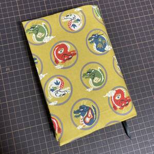 * book cover * separate volume size * hand made! yellow color metal . circle . dragon writing sama!