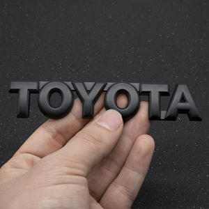 【送料込】TOYOTA 3Dエンブレム(両面テープ付) マットブラック 縦2.4cm×横12cm　金属製 トヨタ 豊田