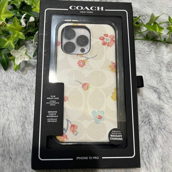 【新品・未使用】【COACH】コーチ★iPhone13pro★シグネチャー花柄ホワイト★携帯カバー★