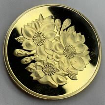 日本古銭　鳳凰菊　桜の女神　約28.97g 天皇陛下御在位記念メダル　一円貨幣　硬貨骨董品コインコレクション　g76 _画像2