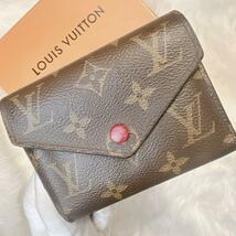 ルイヴィトン LOUIS VUITTON 円 札入れ 折り財布 三つ折り財布 ブラウン 茶色 モノグラム レディース エベヌ フューシャ ピンク_画像1