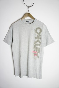 希少 90s～00s OLD OAKLEYオークリー 縦ロゴ Tシャツ 半袖カットソー 灰328O