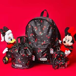 新品ディズニー購入アウトドアコラボ　さくらんぼ柄ミニー　リュック型ポーチ　【人気レア】OUTDOOR ×Disney チェリー柄