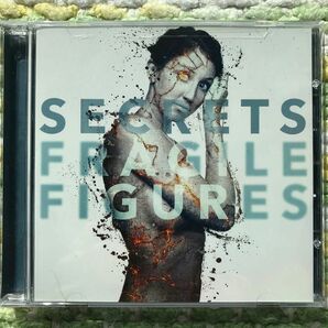 SECRETS - FRAGILE FIGURES