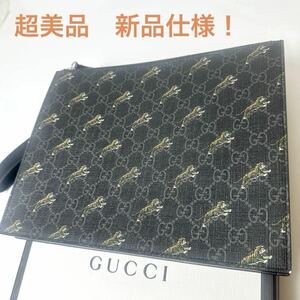 超美品　新品仕様　箱　袋付　GUCCI　クラッチバッグ GGスプリーム トラ柄　575136 黒×ダークグレー×マルチ PVC(塩化ビニール) レア