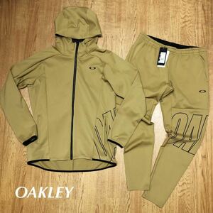  не использовался /OAKLEY / Oacley мужской XXL ENHANCE 3RDG SYNCHRONISM JKT 5.7 жакет брюки выставить тренировка UPF50+. пот скорость .