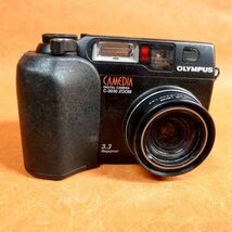 c283 ジャンク OLYMPUS CAMEDIA C3030 ZOOM コンパクトデジタルカメラ サイズ:幅約10.7cm 高さ約7.5cm 奥行約6.5cm/60_画像2