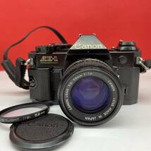 □ Canon AE-1 PROGRAM ボディ ブラック NEW FD 50mm F1.4 レンズ フィルムカメラ 一眼レフカメラ ジャンク キャノン_画像1