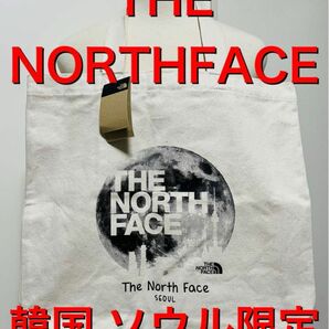 韓国限定.新品本物】2024 THENORTHFACE ノースフェイス トートバッグ　カバン　キャンバス　布　地球　白　ホワイト