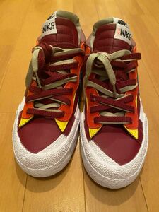 KAWS × sacai × Nike Blazer Low "Team Red"カウズ × サカイ × ナイキ ブレーザー ロー