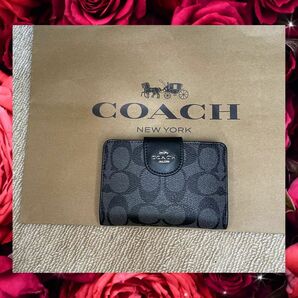 【新品・未使用】　coach 折財布　ネイビー　シグネチャー ミディアム