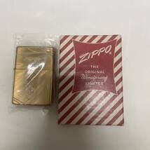 【B-13792】 1円スタート ZIPPO ジッポ Singapore シンガポール ゴールだカラー ライター 箱付き 火花確認済み 状態写真参照_画像1