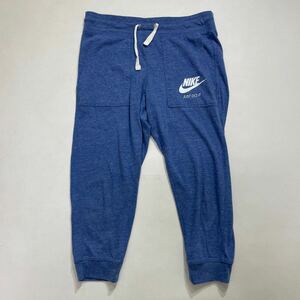 46 NIKE ナイキ クロップドパンツ ジョガーパンツ カプリ サイズM スウッシュプリント スポーツ トレーニング フィットネス 春夏 40406Y