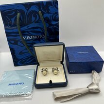 q569　MIKIMOTO　ミキモト真珠島　真珠ピアス　ポストK10? K18? 刻印あり　リボンモチーフ　アクセサリー_画像1